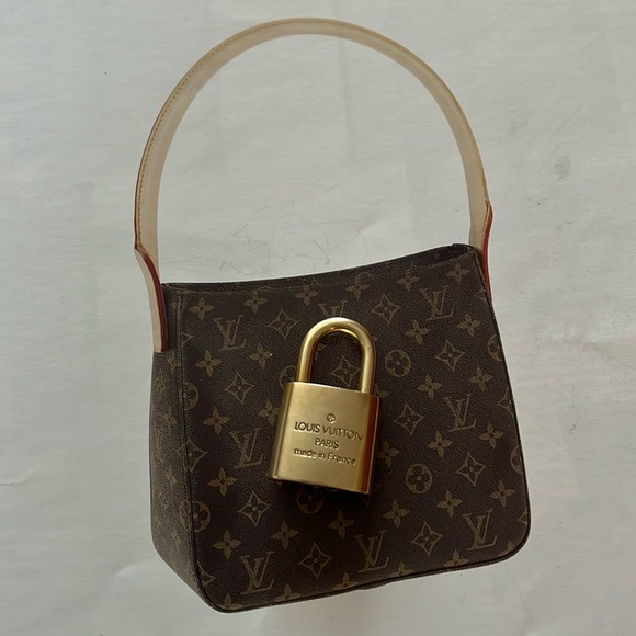 • Sold• Louis Vuitton Lock #303 (No key, comes with necklace) - Picture 7 of 10